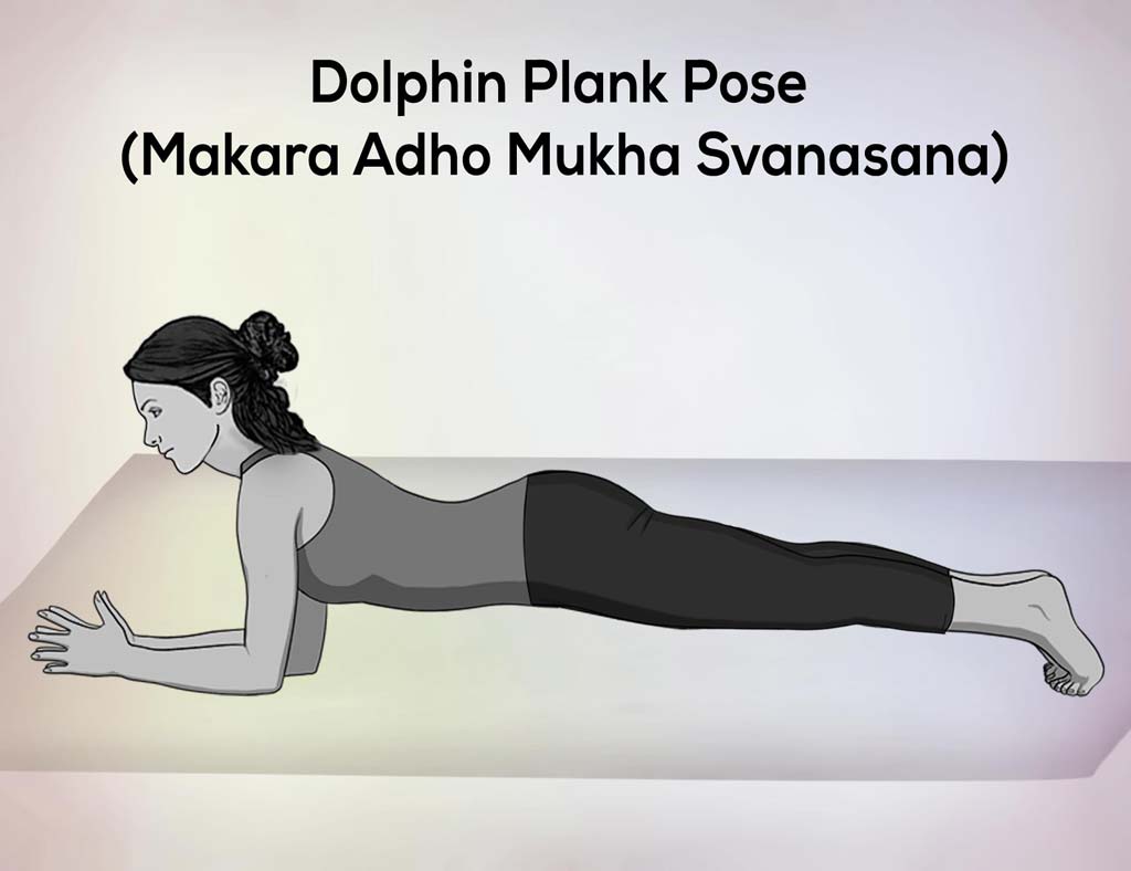 A Girl doing a Dolphin Plank Pose, It is also called Makara Adho Mukha Svanasana.