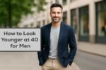 Confident middle-aged man in a smart blazer smiling outdoors in an urban setting – looking stylish and youthful at 40 and beyond